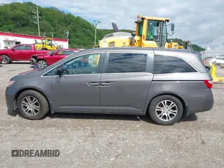2012 Honda Odyssey EX-L with VIN 5FNRL5H68CB060487, listed as a IAAI auction lot 42176223 with 234,078 mi miles and . Bid and sale history available at DreamBid. Image 15.
