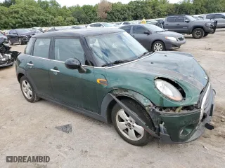 2017 MINI Hardtop 4 Door Cooper with VIN WMWXU1C57H2E18281, listed as a Copart auction lot 69714554 with 77,049 mi miles and Salvage Title. Bid and sale history available at carsss.com. Image 4.