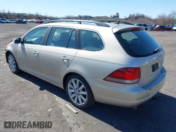 2014 Volkswagen Jetta SportWagen TDI with VIN 3VWPL7AJ8EM610672, listed as a IAAI auction lot 41811091 with 129,554 mi miles. Bid and sale history available at carsss.com. Image 3.