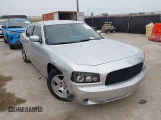 2010 Dodge Charger SXT with VIN 2B3CA3CV0AH237203, listed as a IAAI auction lot 42058517 with 257,514 mi miles and . Bid and sale history available at DreamBid. Image 1.
