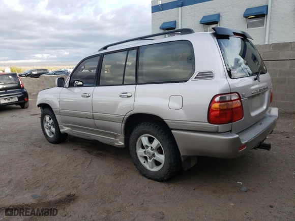 2001 Toyota Land Cruiser with VIN JTEHT05J912005517, listed as a Copart auction lot 50911195 with 273,929 mi miles and Salvage Title. Bid and sale history available at carsss.com. Image 2.