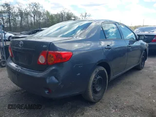 2010 Toyota Corolla with VIN 2T1BU4EE0AC521946, listed as a IAAI auction lot 42049301 with 169,807 mi miles. Bid and sale history available at carsss.com. Image 4.
