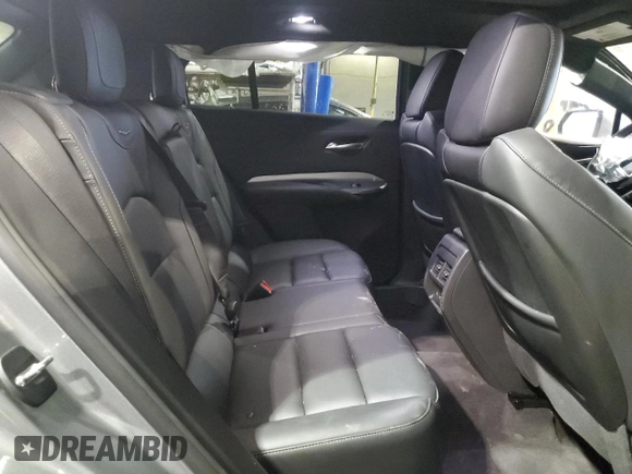 2023 Cadillac XT4 AWD Premium Luxury z VIN 1GYFZDR4XPF109449, wystawiony jako Copart lot #46712405 z przebiegiem 10 882 mil mil oraz Czysty tytuł • Clean title. Historia ofert i sprzedaży dostępna na DreamBid. Obrazek 11.