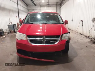 2013 Dodge Grand Caravan SXT with VIN 2C4RDGCG9DR669053, listed as a IAAI auction lot 41626033 with 170,007 mi miles and . Bid and sale history available at DreamBid. Image 13.