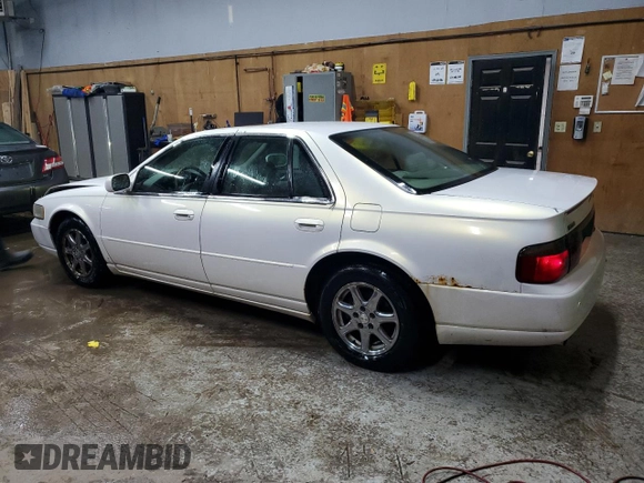 2004 Cadillac Seville Luxury SLS z VIN 1G6KS54Y24U168062, wystawiony jako Copart lot #84865574 z przebiegiem 240 052 mil mil oraz Tytuł czysty. Historia ofert i sprzedaży dostępna na DreamBid. Obrazek 2.