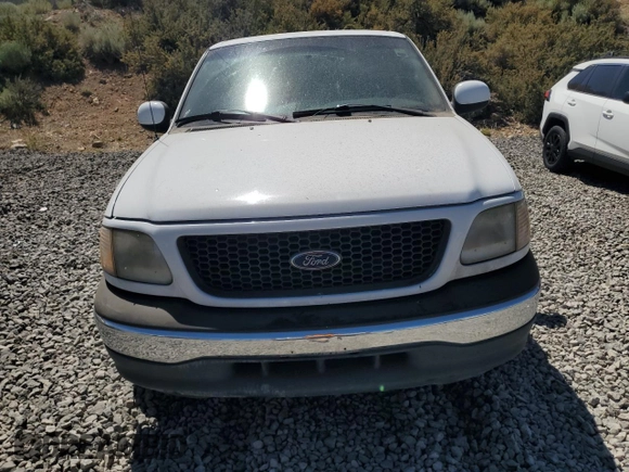 2001 Ford F-150 XL with VIN 1FTZX17251NB12930, listed as a Copart auction lot 62517295 with Not provided miles and Salvage title. Bid and sale history available at DreamBid. Image 5.
