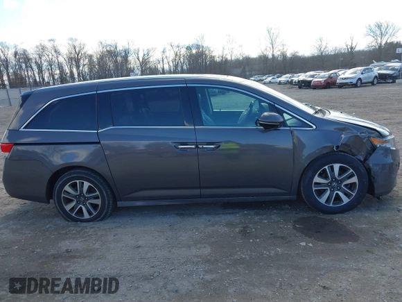 2016 Honda Odyssey Touring Elite with VIN 5FNRL5H90GB128006, listed as a IAAI auction lot 41695438 with 133,337 mi miles. Bid and sale history available at carsss.com. Image 13.
