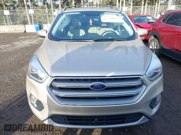 2017 Ford Escape Titanium with VIN 1FMCU0JD0HUB79739, listed as a IAAI auction lot 41807975 with 121,902 mi miles. Bid and sale history available at carsss.com. Image 12.