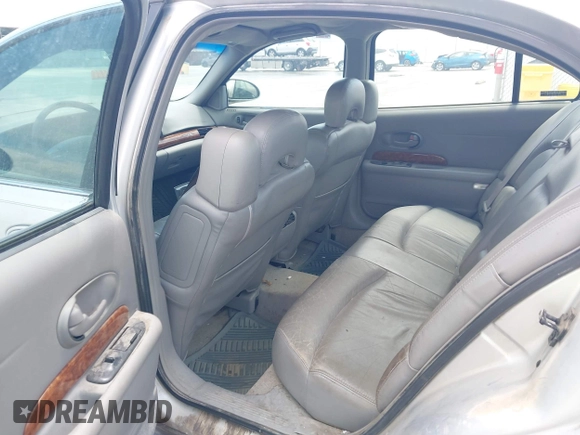 2001 Buick LeSabre Limited z VIN 1G4HR54K41U111156, wystawiony jako IAAI lot #42370625 z przebiegiem 216 032 mil mil oraz . Historia ofert i sprzedaży dostępna na DreamBid. Obrazek 8.