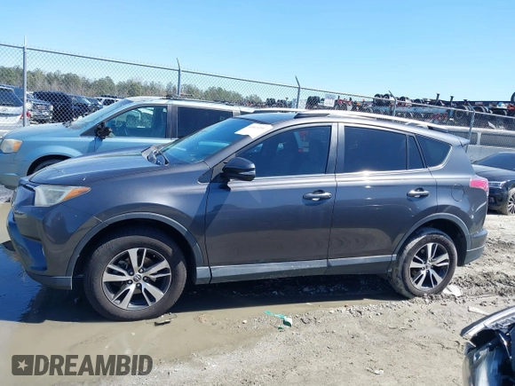 2018 Toyota RAV4 XLE with VIN 2T3WFREV9JW503136, listed as a IAAI auction lot 41815266 with 118,585 mi miles. Bid and sale history available at carsss.com. Image 14.