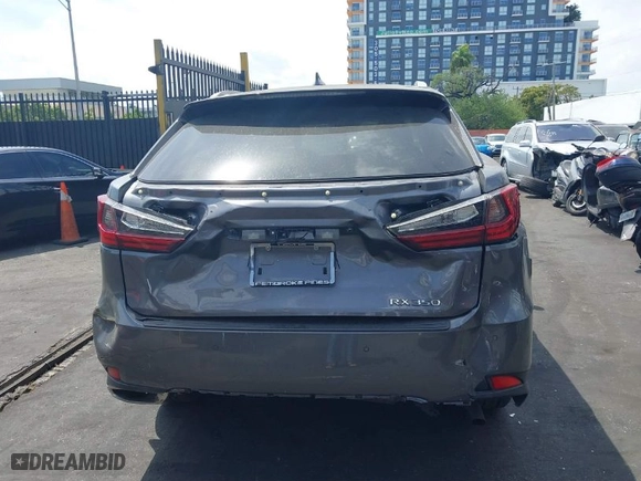 2022 Lexus RX with VIN 2T2HZMAAXNC228510, listed as a IAAI auction lot 41879028 with 87,595 mi miles. Bid and sale history available at carsss.com. Image 17.