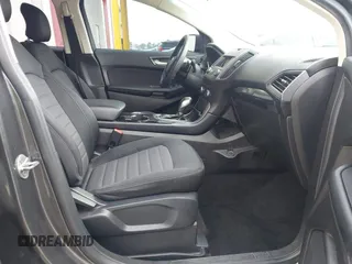 2017 Ford Edge SE z VIN 2FMPK3G97HBC65342, wystawiony jako IAAI lot #42610031 z przebiegiem 103 521 mil mil oraz . Historia ofert i sprzedaży dostępna na DreamBid. Obrazek 5.