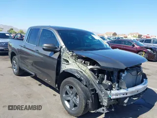 2022 Honda Ridgeline RTL with VIN 5FPYK3F58NB007618, listed as a IAAI auction lot 42258443 with 14,036 mi miles and . Bid and sale history available at DreamBid. Image 1.