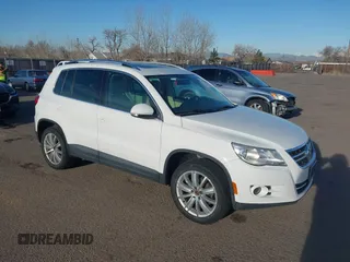 2011 Volkswagen Tiguan SE with VIN WVGBV7AXXBW554852, listed as a IAAI auction lot 41799439 with 157,211 mi miles and . Bid and sale history available at DreamBid. Image 1.