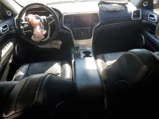 2018 Jeep Grand Cherokee Summit with VIN 1C4RJFJT0JC344430, listed as a Copart auction lot 58099905 with 109,089 mi miles and Salvage title. Bid and sale history available at DreamBid. Image 8.