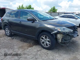 2015 Mazda CX-9 Touring with VIN JM3TB3CV8F0462807, listed as a IAAI auction lot 42562198 with 189,241 mi miles and . Bid and sale history available at DreamBid. Image 1.