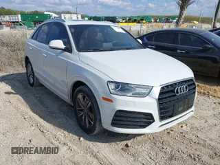 2018 Audi Q3 Premium with VIN WA1BCCFS6JR010047, listed as a IAAI auction lot 41795209 with 99,609 mi miles. Bid and sale history available at carsss.com. Image 1.