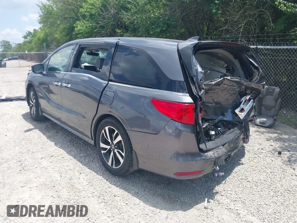 2018 Honda Odyssey Elite with VIN 5FNRL6H95JB087952, listed as a IAAI auction lot 42579817 with 96,577 mi miles and . Bid and sale history available at DreamBid. Image 3.