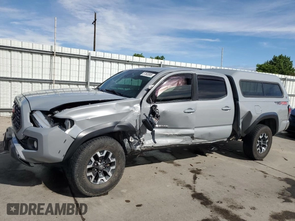 2020 Toyota Tacoma SR5 with VIN 3TMDZ5BN6LM097302, listed as a Copart auction lot 57503895 with 77,212 mi miles and Salvage title. Bid and sale history available at DreamBid. Image 1.