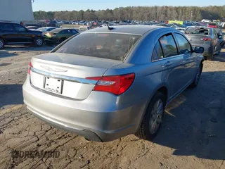 2013 Chrysler 200 LX with VIN 1C3CCBAG0DN739457, listed as a IAAI auction lot 41326667 with 82,537 mi miles. Bid and sale history available at carsss.com. Image 4.