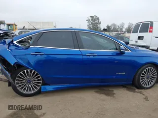 2018 Ford Fusion Titanium with VIN 3FA6P0RU8JR124066, listed as a IAAI auction lot 42106389 with Not Provided miles and . Bid and sale history available at DreamBid. Image 13.
