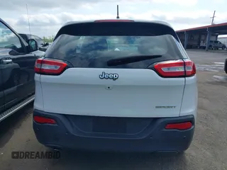 2016 Jeep Cherokee Altitude with VIN 1C4PJLAB4GW290666, listed as a IAAI auction lot 42052140 with 77,116 mi miles. Bid and sale history available at carsss.com. Image 16.