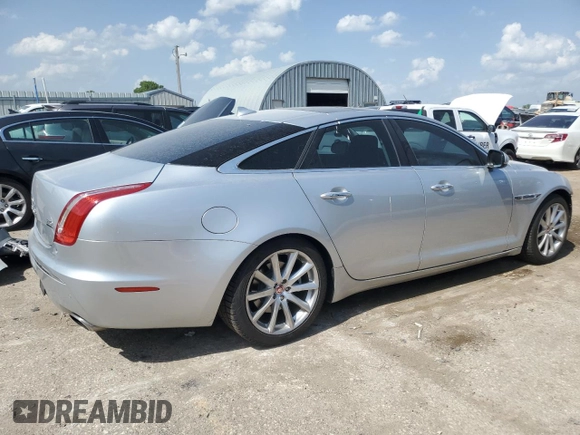 2015 Jaguar XJ with VIN SAJWJ1CD1F8V75232, listed as a Copart auction lot 57605685 with 146,314 mi miles and Salvage title. Bid and sale history available at DreamBid. Image 3.