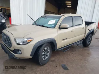 2020 Toyota Tacoma SR5 with VIN 5TFCZ5AN7LX231676, listed as a IAAI auction lot 42596728 with 101,362 mi miles and . Bid and sale history available at DreamBid. Image 2.