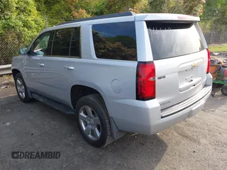 2019 Chevrolet Tahoe LT with VIN 1GNSCBKCXKR219413, listed as a IAAI auction lot 42013260 with 92,886 mi miles and . Bid and sale history available at DreamBid. Image 3.