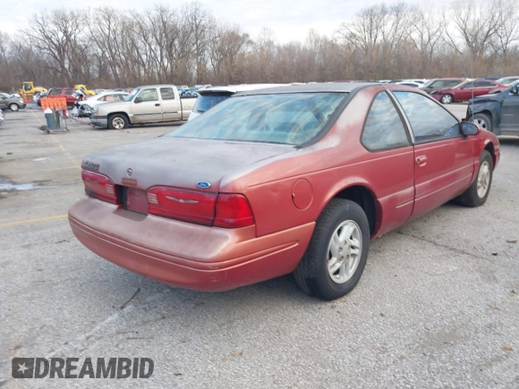 1997 Ford Thunderbird LX z VIN 1FALP62W8VH161871, wystawiony jako IAAI lot #41018103 z przebiegiem 138 915 mil mil oraz . Historia ofert i sprzedaży dostępna na DreamBid. Obrazek 4.