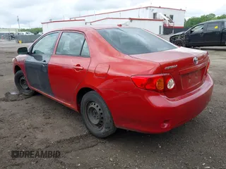2009 Toyota Corolla with VIN JTDBL40E399050323, listed as a IAAI auction lot 42206910 with 180,935 mi miles. Bid and sale history available at carsss.com. Image 3.
