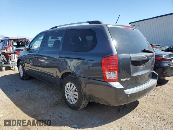 2012 Kia Sedona LX with VIN KNDMG4C71C6461660, listed as a Copart auction lot 70904534 with 163,548 mi miles and Clean Title. Bid and sale history available at carsss.com. Image 2.