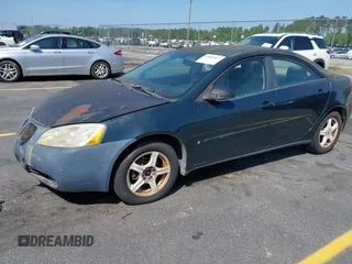 2006 Pontiac G6 z VIN 1G2ZF55B464255298, wystawiony jako IAAI lot #42049077 z przebiegiem 149 863 mil mil oraz . Historia ofert i sprzedaży dostępna na DreamBid. Obrazek 2.