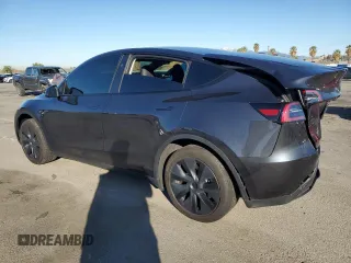 2024 Tesla Model Y with VIN 7SAYGDED7RF108604, listed as a Copart auction lot 48384825 with 24,603 mi miles and Salvage Title. Bid and sale history available at DreamBid. Image 2.