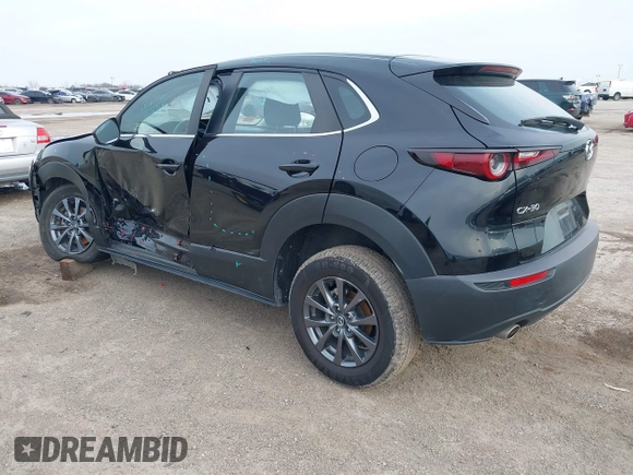 2021 Mazda CX-30 2.5 S with VIN 3MVDMAAL2MM303321, listed as a IAAI auction lot 41583346 with 57,122 mi miles. Bid and sale history available at carsss.com. Image 3.