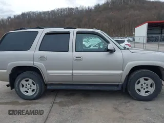 2004 Chevrolet Tahoe LS with VIN 1GNEK13Z74J181914, listed as a IAAI auction lot 41881310 with 213,223 mi miles. Bid and sale history available at carsss.com. Image 13.