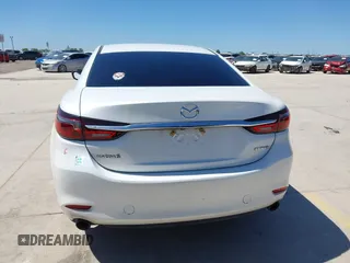2021 Mazda 6 Touring with VIN JM1GL1VM4M1618686, listed as a IAAI auction lot 42079730 with 55,539 mi miles and . Bid and sale history available at DreamBid. Image 16.