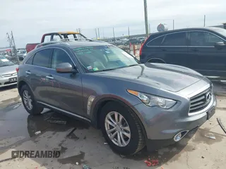 2014 Infiniti QX70 with VIN JN8CS1MW2EM412582, listed as a IAAI auction lot 41449958 with 100,115 mi miles and . Bid and sale history available at DreamBid. Image 1.