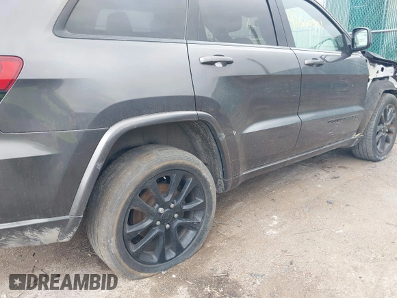 2018 Jeep Grand Cherokee Altitude z VIN 1C4RJFAGXJC190814, wystawiony jako IAAI lot #42660901 z przebiegiem 127 632 mil mil oraz . Historia ofert i sprzedaży dostępna na DreamBid. Obrazek 6.