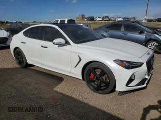 2021 Genesis G70 3.3T with VIN KMTG74LEXMU070081, listed as a Copart auction lot 72065504 with 73,851 mi miles and Clean Title. Bid and sale history available at carsss.com. Image 4.