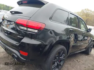 2017 Jeep Grand Cherokee SRT z VIN 1C4RJFDJ7HC683240, wystawiony jako IAAI lot #41919995 z przebiegiem 122 030 mil mil oraz . Historia ofert i sprzedaży dostępna na DreamBid. Obrazek 21.