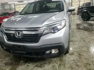2018 Honda Ridgeline RTL-T z VIN 5FPYK3F65JB001004, wystawiony jako Copart lot #89132755 z przebiegiem 122 572 mil mil oraz Szkody całkowita. Historia ofert i sprzedaży dostępna na DreamBid. Obrazek 13.