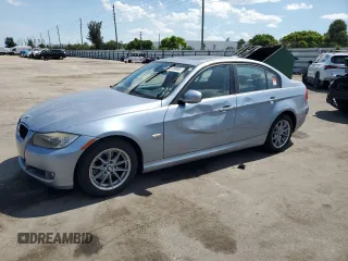 2010 BMW 3 Series 328i xDrive with VIN WBAPK5C51AA647206, listed as a Copart auction lot 52139085 with 115,883 mi miles and Salvage title. Bid and sale history available at DreamBid. Image 1.