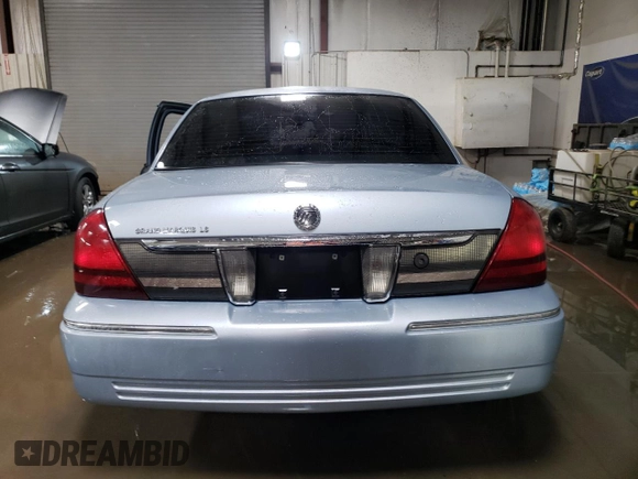 2010 Mercury Grand Marquis LS z VIN 2MEBM7FV1AX630474, wystawiony jako Copart lot #52318615 z przebiegiem Nie podano mil oraz Szkoda całkowita • Salvage title. Historia ofert i sprzedaży dostępna na DreamBid. Obrazek 6.