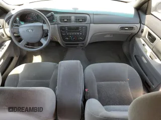 2006 Ford Taurus SE with VIN 1FAFP53UX6A194398, listed as a Copart auction lot 59582515 with 114,933 mi miles and Salvage title. Bid and sale history available at DreamBid. Image 8.