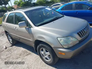 2001 Lexus RX 300 with VIN JTJGF10U910084730, listed as a IAAI auction lot 42059606 with 311,387 mi miles. Bid and sale history available at carsss.com. Image 1.