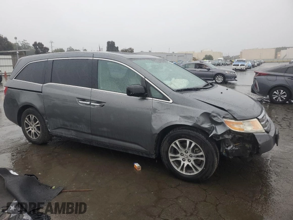 2011 Honda Odyssey EX-L with VIN 5FNRL5H64BB050425, listed as a Copart auction lot 49101795 with 192,238 mi miles and Salvage Title. Bid and sale history available at DreamBid. Image 4.