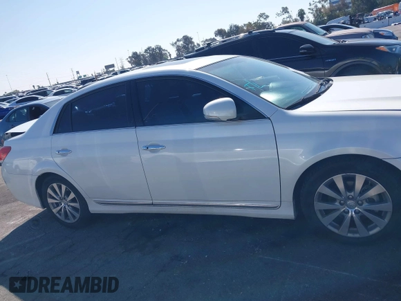 2012 Toyota Avalon with VIN 4T1BK3DB1CU469574, listed as a IAAI auction lot 41633881 with 128,425 mi miles and . Bid and sale history available at DreamBid. Image 13.