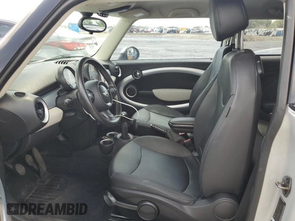 2012 MINI Hardtop with VIN WMWSU3C54CT186406, listed as a Copart auction lot 60940305 with 106,819 mi miles and Salvage title. Bid and sale history available at DreamBid. Image 7.
