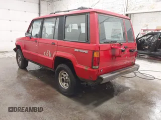 1991 Isuzu Trooper z VIN JACCH58R6M8905869, wystawiony jako IAAI lot #42394651 z przebiegiem 117 130 mil mil oraz . Historia ofert i sprzedaży dostępna na DreamBid. Obrazek 3.